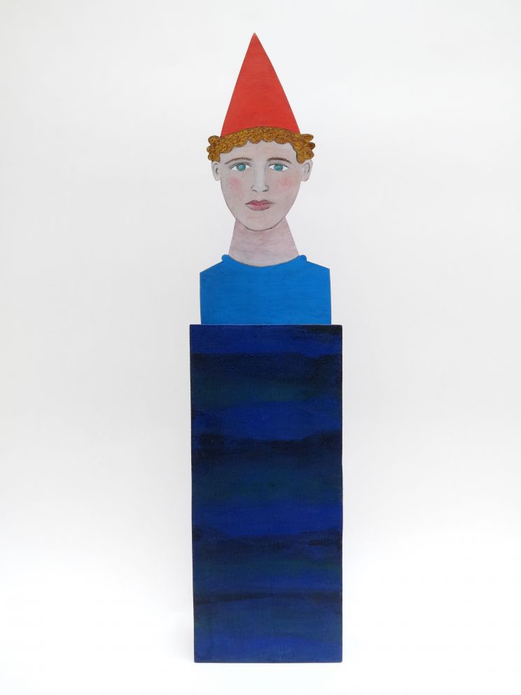 Jeune clown aux yeux bleus en verre