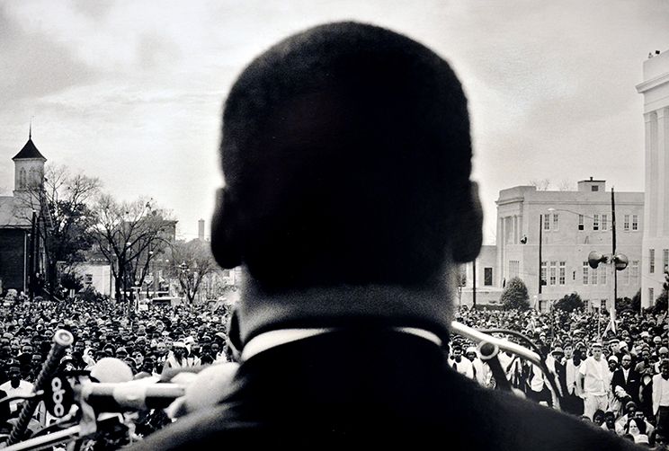 Dr. Martin Luther King, Jr. speaking to crowd of 25,000 at end of march